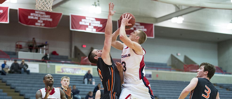 No. 24 Oilers Fend Off Cardinals, 64-56