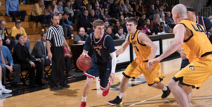 Cardinal Comeback Falls Short as Huskies Claim Victory in League Opener